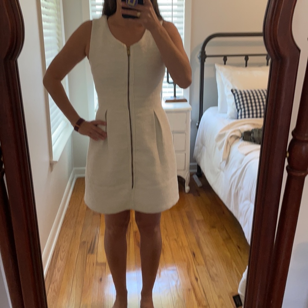 White dress but has some shimmer in the material.